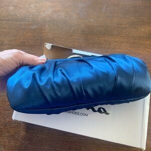Blue satin evening clutch.